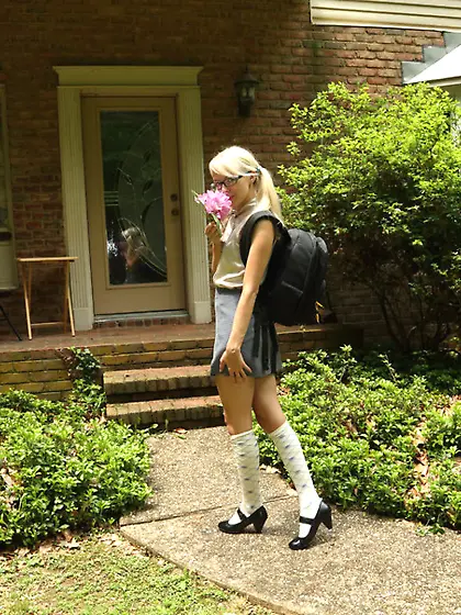 Pigtailed blonde school chick