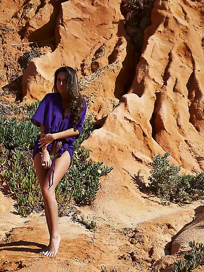 Sweet tanned hussy strips to tiny bikini panties and models outd