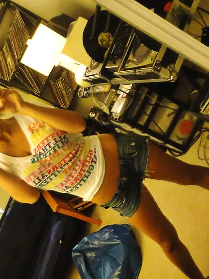 Beautiful blonde spends days naked.  She listens to music,  reads