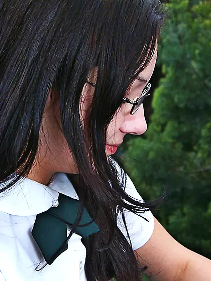 Four-eyed uniform college girl Kathleen Kruz playfully shows her