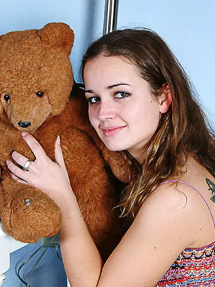 Brown haired cutie Louisa Rosso with small tits gives a close-up