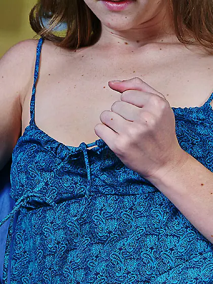 Brown haired babe Lisa Marie playfully removes her white panties