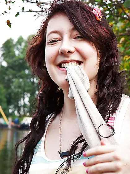 Well developed and sensual woman wearing a sexy outfit outside