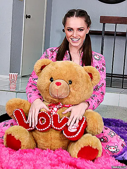 Small titted brown haired cutie Tori Black takes off her pink pa