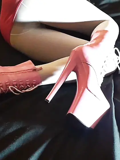 Pink platform heels and white stockings