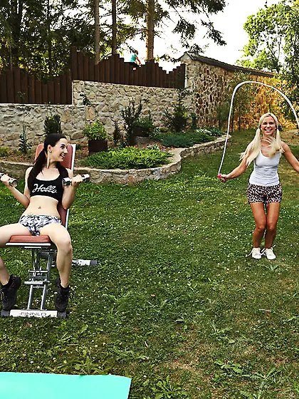 Two pigtailed teens are playing with the...