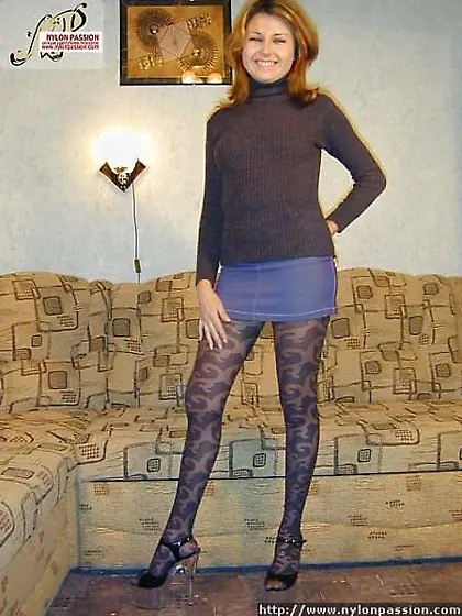 Pantyhosed blondie exhibiting herself