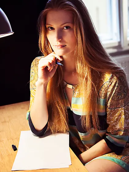 Pretty young woman is so serious stripping cause it's a crucial