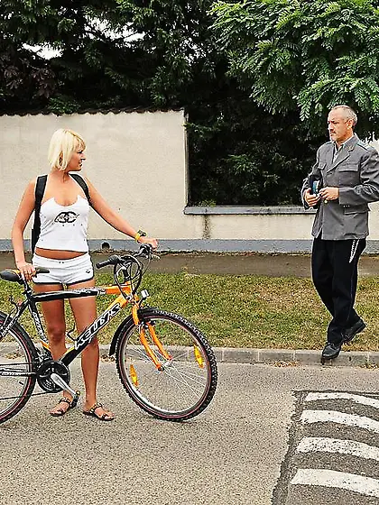 Older man catches a sexy blonde on a bicycle and punishes her ho