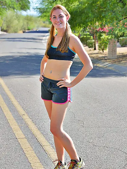 Jogging blonde Bailey Rayne flaunts her sweet ass on the road an