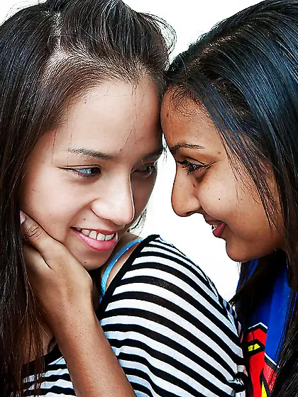 Brunette young women kiss and display unshaved vaginas in the ru