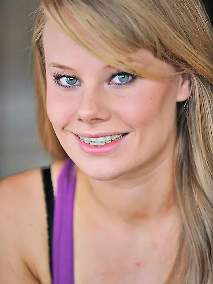 Blue eyed girl Brigitte FTV takes off her tight violet dress and