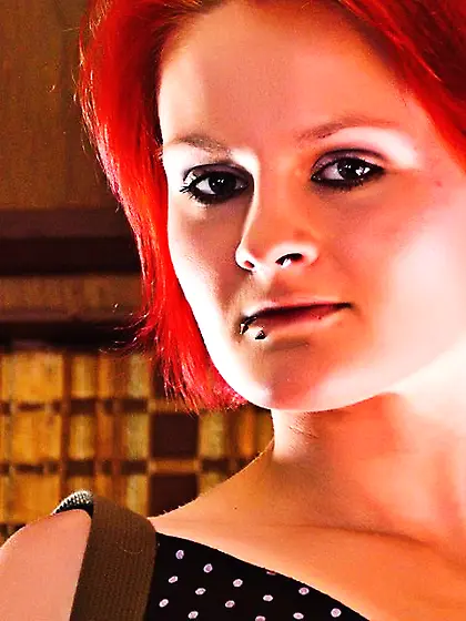 Naked redhead babe Dolly Destruction climbs the table to boast t