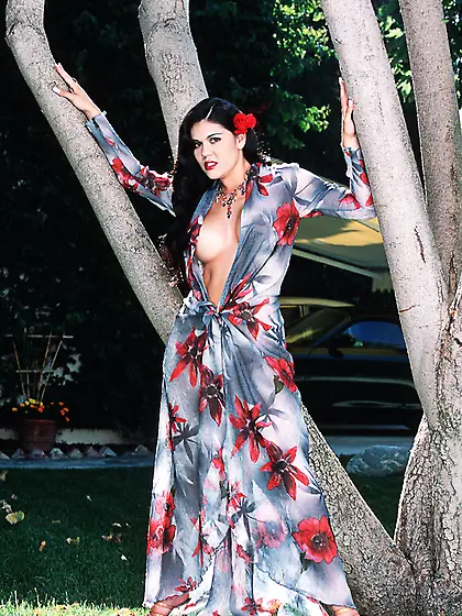 Hot busty brunette Olivia O'Lovely strips her dress and sho