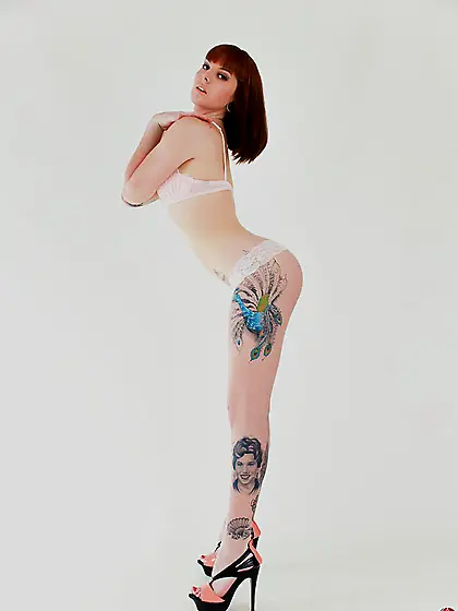 The delicious redhead teaser Ashalynn Afterlife sexily poses the