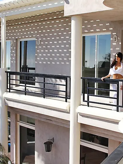 Tanned brunette with a slim body rides this guy's massive c