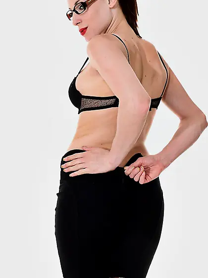 Sexy looking brunette Victoria Daniels with glasses enjoys in st