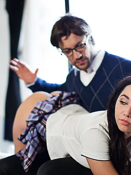 Tempting brunette wearing schoolgirl