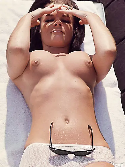 Cute brunette model shows her natural titties