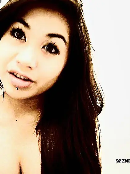 Exotic brunette rocking outfits