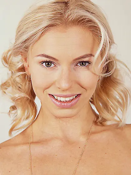 Frisky goldilocks Solange with cute ponytails bares her lingerie