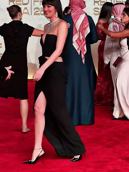 Dakota Johnson in a plunging black dress