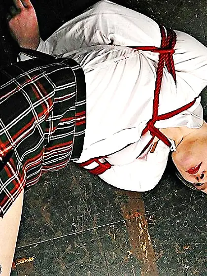 Naughty tied up schoolgirl enjoys rough caning