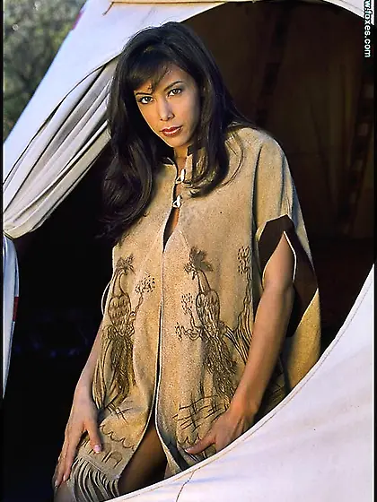 Busty dark-haired babe loves nature so much that she even lives