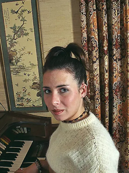 Busty college girl Andy Brown shows tits and lifts up skirt to p