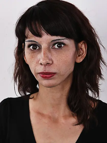 Skinny brunette black blouse