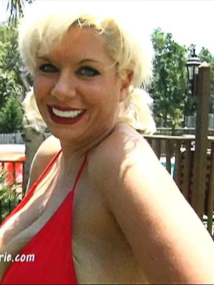 Wet BBW blonde posing next to a newly washed...