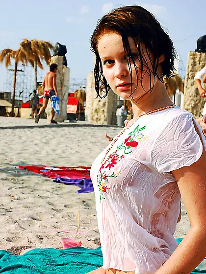 Silvia B strips her sexy bikini outdoors on the beach and shows