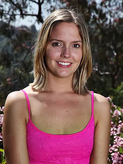 Hot teen Megan Sweetz gets out of her frilly pink dress in the g