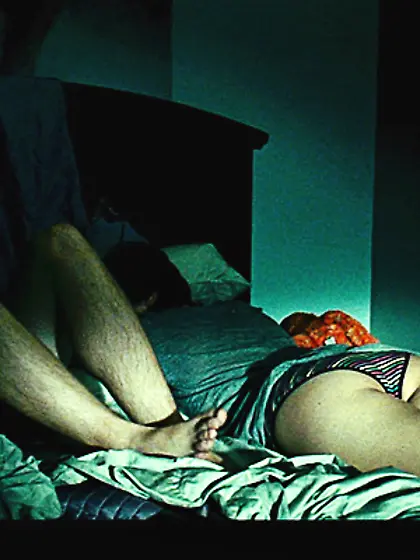 Naked fox feverishly rubs