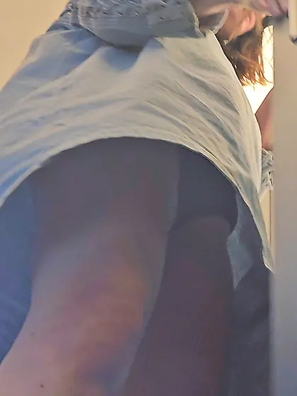 Upskirt denim dress and black string