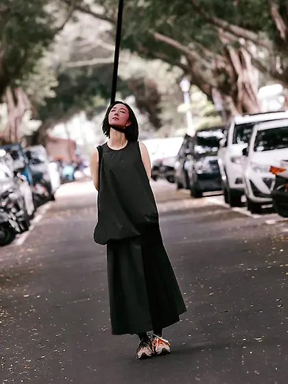 A long graceful neck stretched tightly