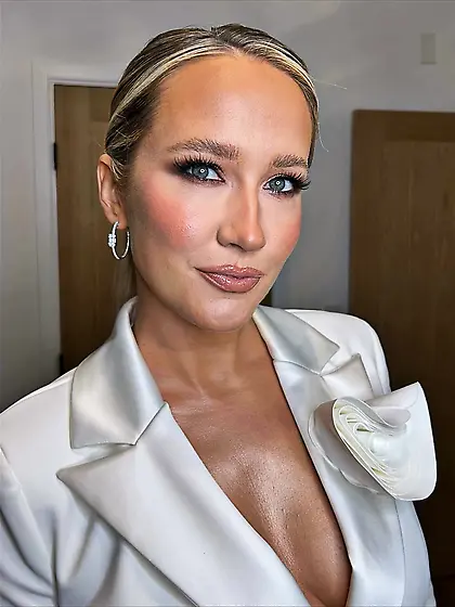 Anna Canp in a white top