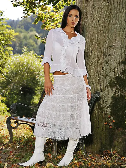 Overdressed brunette takes off her fancy white outfit outdoors V