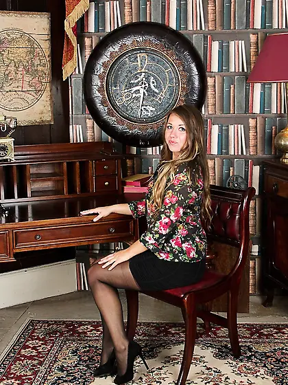 Round-faced MILF takes off her see-through black panties in a fa