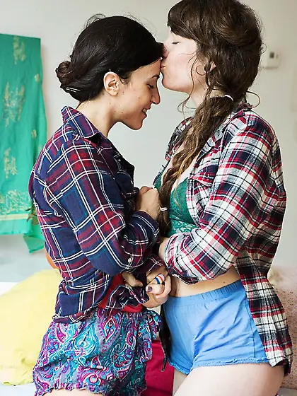 Two unshaved chicks with small boobs tease each other for the fi