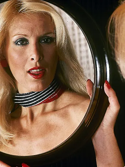 Retro blond model in red stockings fucks...