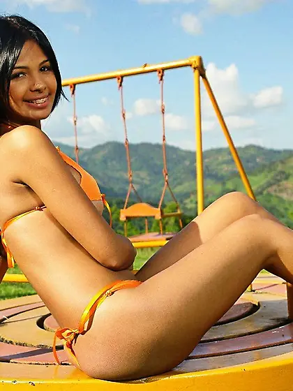 Wild tanned brunette Karla Spice showing sexy butt wearing yello