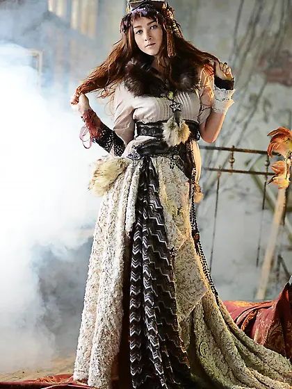 Redhead teen Ruzanna A takes off her intricate outfit and shows