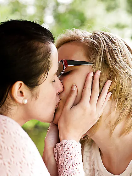 A couple of hot gals expressing their eroticism through a galler