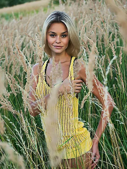 The exciting blonde girl Taylor A has the hairy pussy to show to