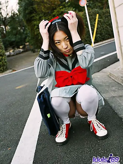 Doll looking Asian girl Saeki Mai is posing erotically in the un