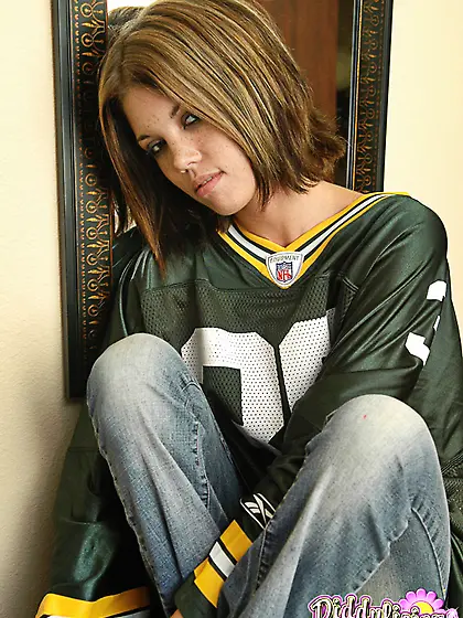 Football fan undresses and covers pussy using a piece of artific