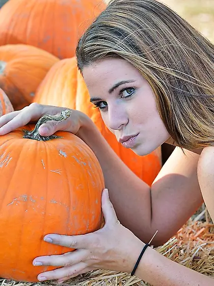 Dress-wearing beauty bends over to show off her juicy pussy BIG