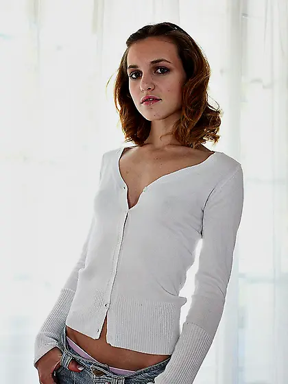 Slender girl Kasey Chase with cute small tits strips naked and g