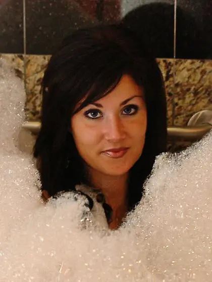 Horny brunette chick Sweet Krissy takes off her clothes and take